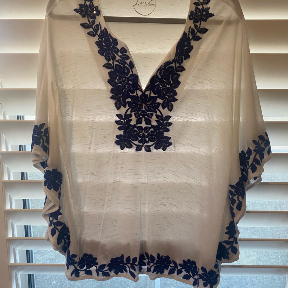 INC white top with blue floral trim. Size XL. lightweight & in good condition